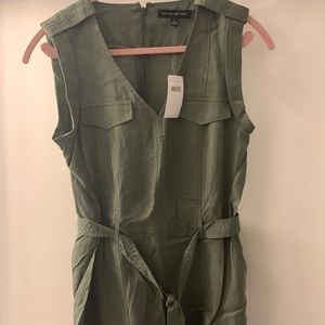 Army green jumpsuit.